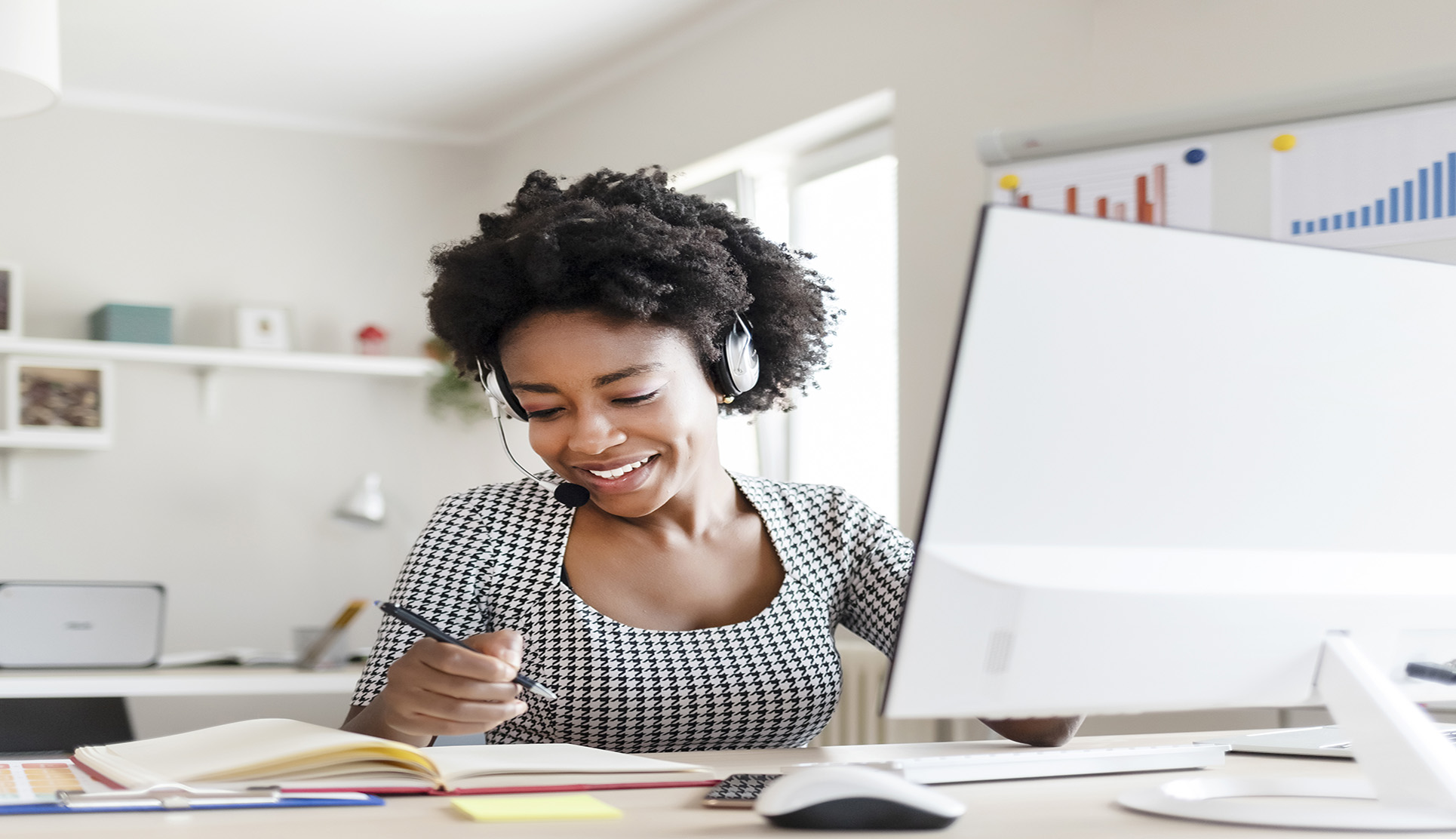 Black girl working and writing