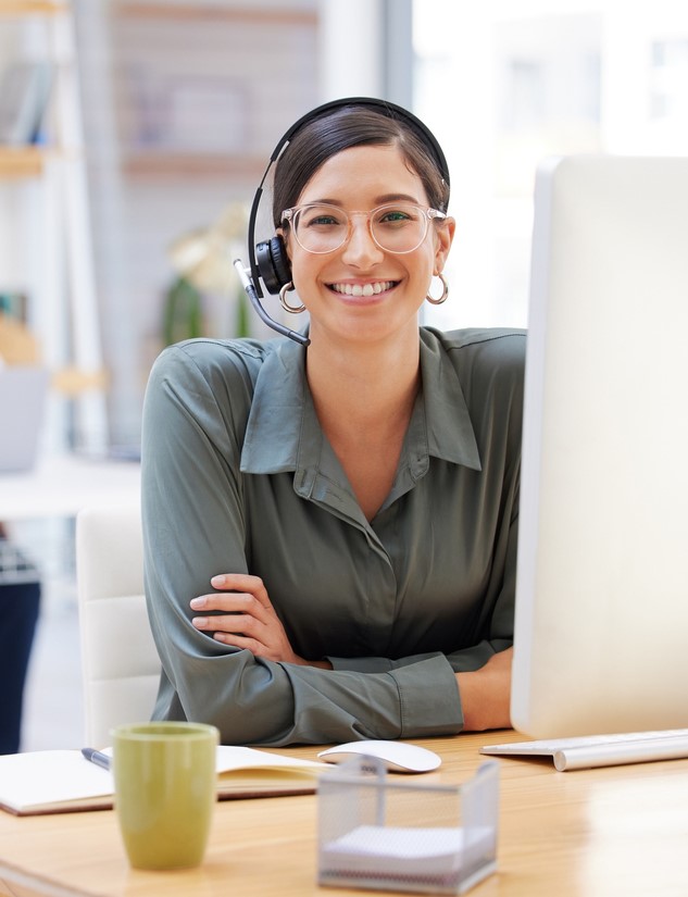 Shot of a young businesswoman working in call center