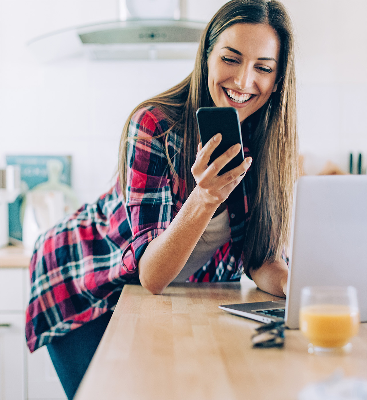 Girl looking at the phone and smiling