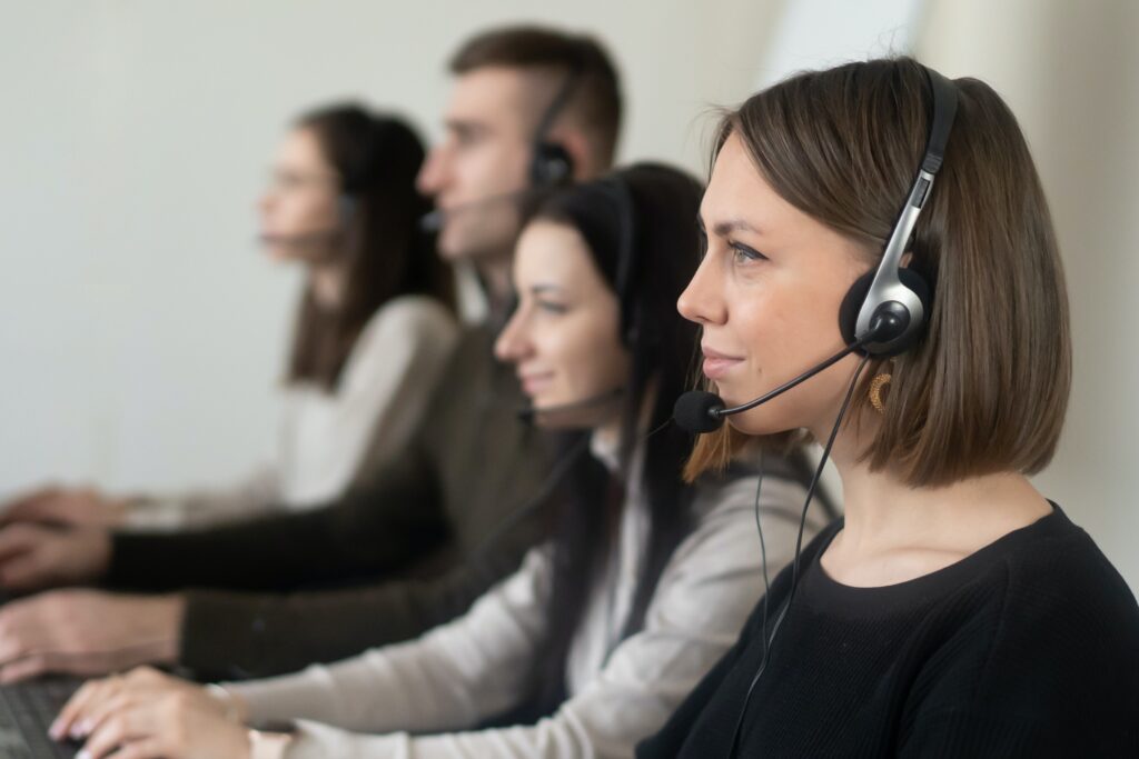 Agents with headsets in an call center 