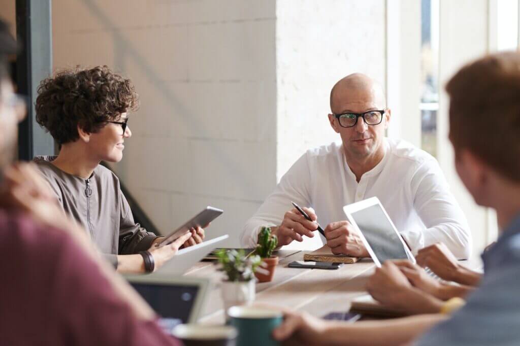 A group of people working in the office