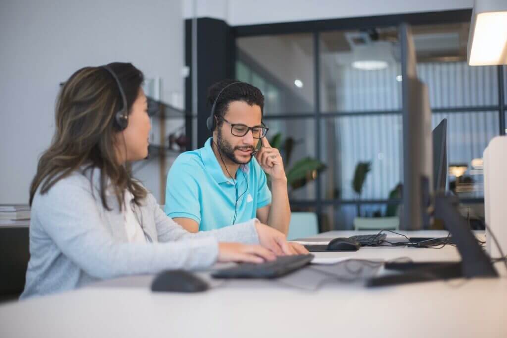 Two colleagues at a contact center