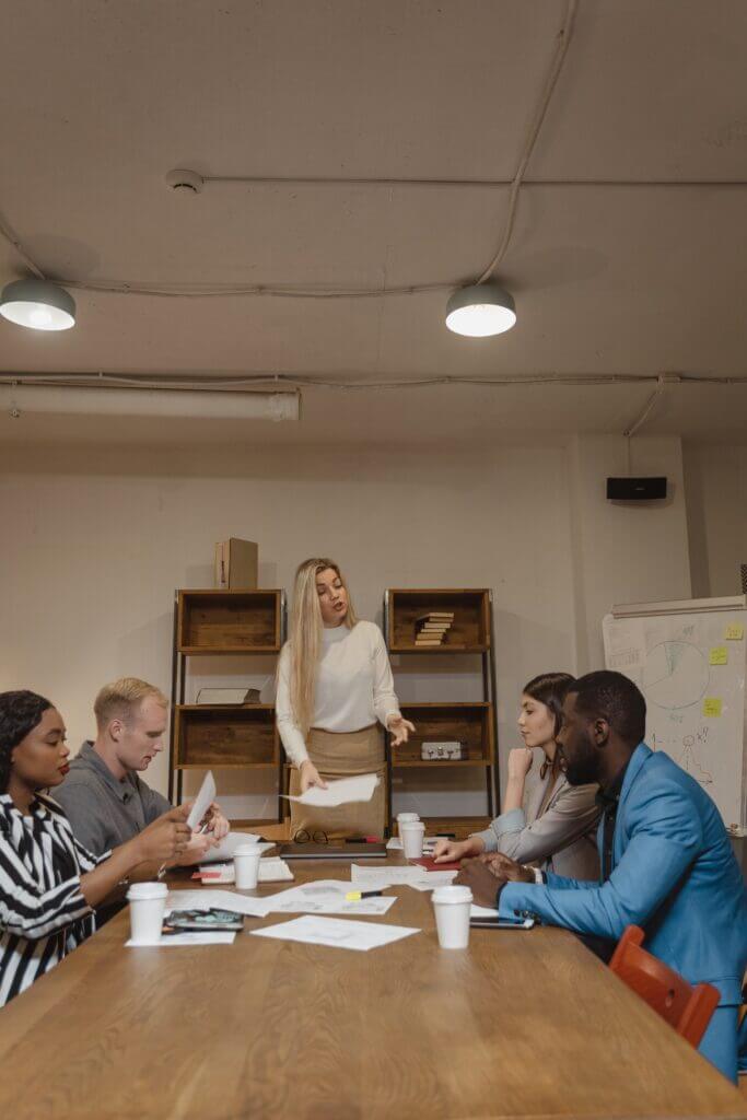 Meeting of Call Center Managers at a table