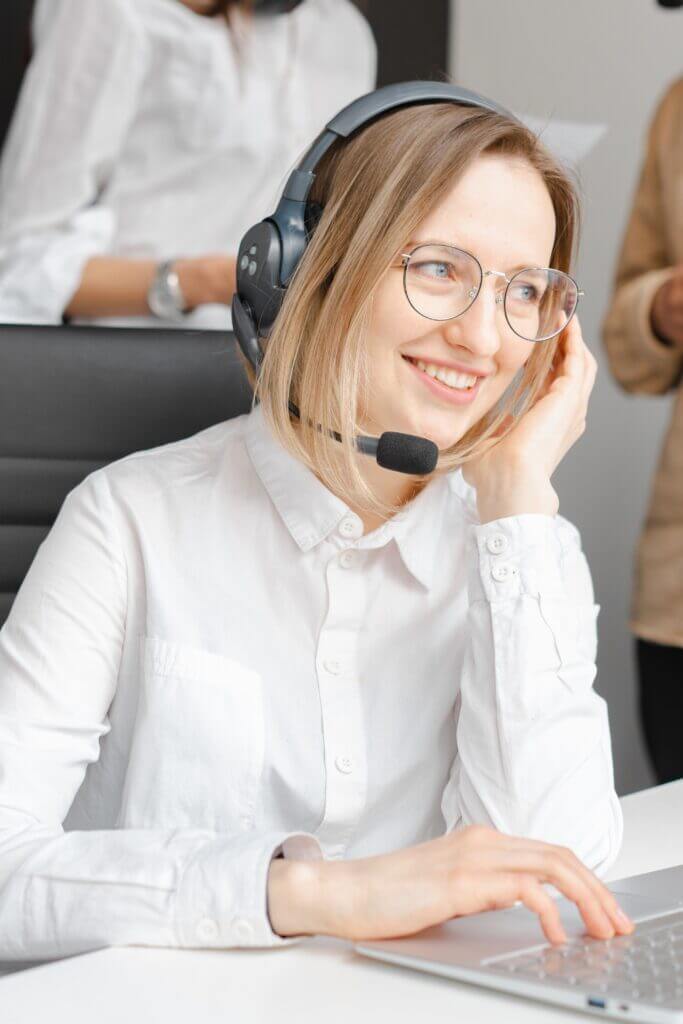 A contact center agent with a headset