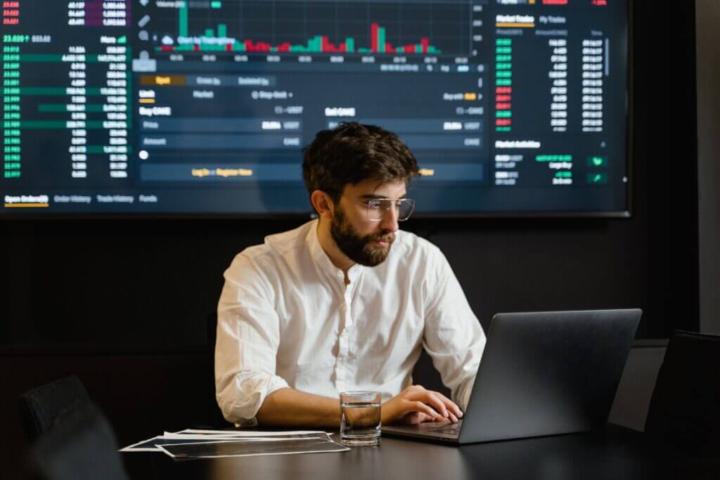 Workforce Management Expert at the computer.