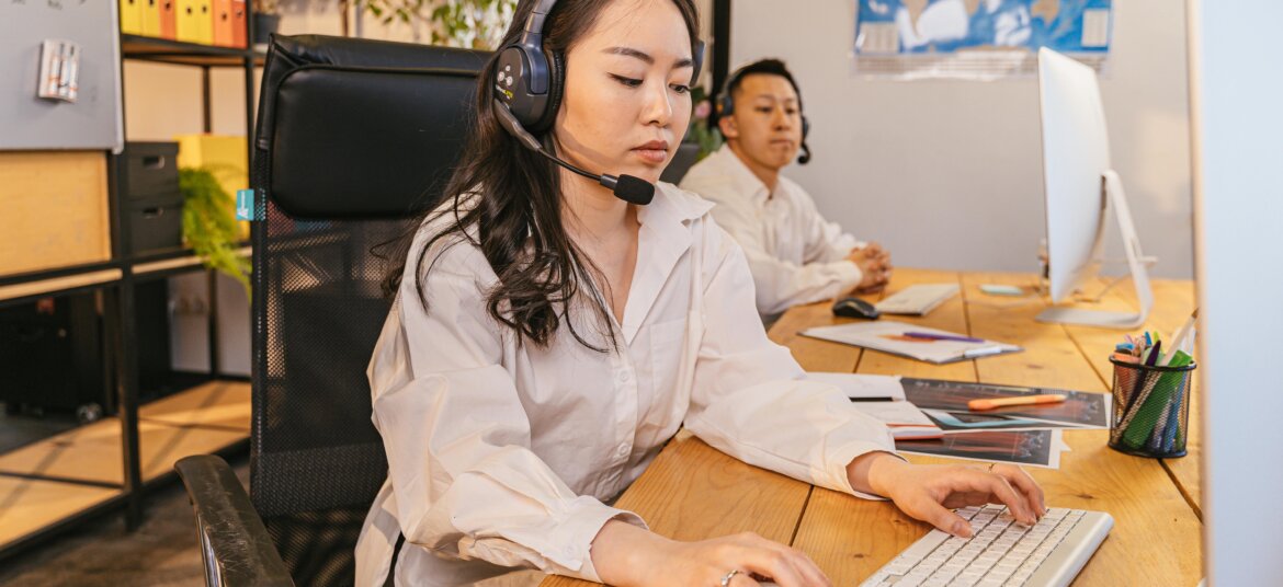 People Working in Call Center Office